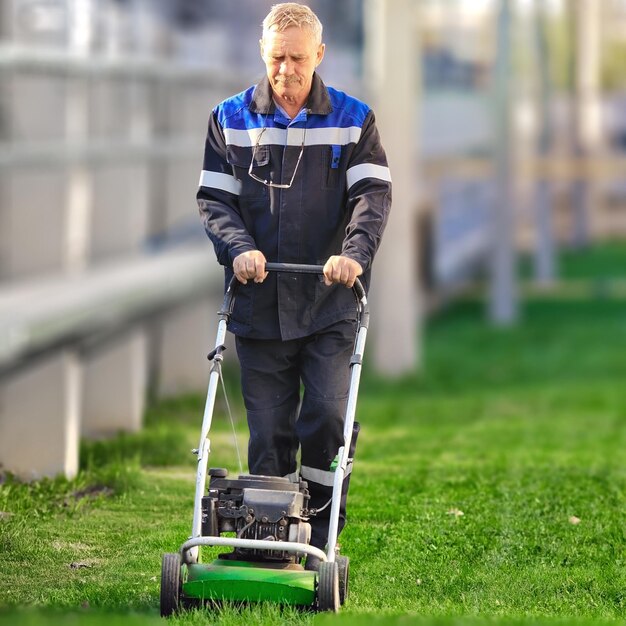 Naked Man Mowing The Lawn